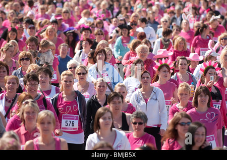 Women taking part in the annual cancer research charity fund raising RACE FOR LIFE ABERYSTWYTH MAY 16 2010 Stock Photo