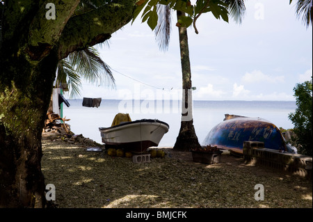 Two boats drawn up in a lagoon-side yard in Jabor, Jaluit Atoll, Marshall Islands Stock Photo