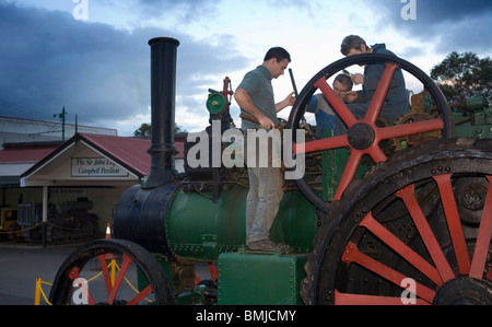 Workers fixing a 1800s steam train engine, Auckland, New Zealand Stock Photo