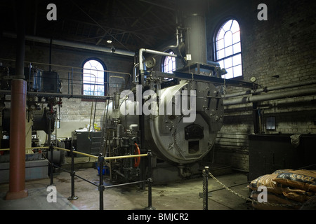 A nineteenth (XIX) century (1800s) heat machine room with a big coal boiler, Auckland, New Zealand Stock Photo