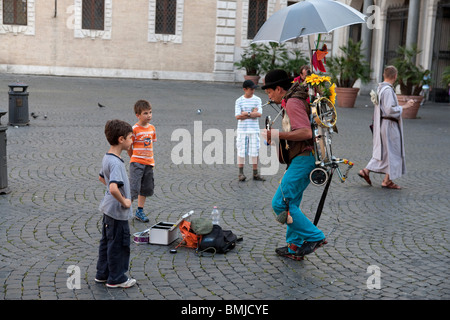 A street artist in Piazza Santa Maria in Trastevere, Rome Italy. Stock Photo