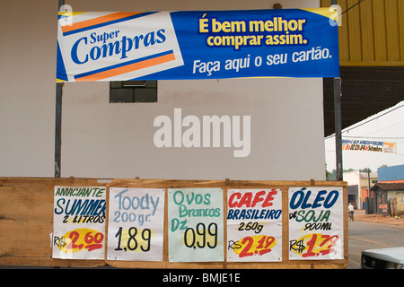 Advertisement at the entrance of a supermarket, Poconé, Mato Grosso state, Brazil Stock Photo