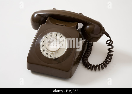 GPO / Post office domestic residential telephone from around 1970, with dial. (Phone number on the dial has had a digit deleted) Stock Photo