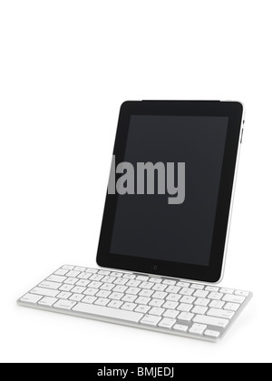 Apple iPad 3G tablet computer with a keyboard dock accessory isolated on white background with clipping path Stock Photo