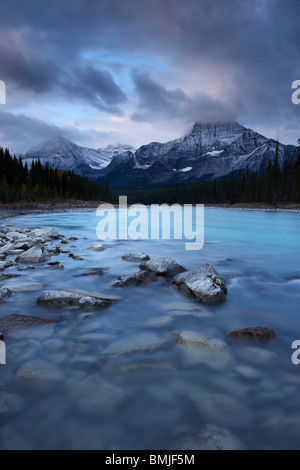 the Athabasca River with Dragon Peak and the Winston Churchill Range at dawn, Jasper National Park, Alberta, Canada Stock Photo
