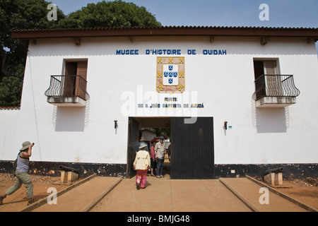 Africa, West Africa, Benin, Ouidah. People at entrance to Musee D'Histoire (History Museum) Stock Photo