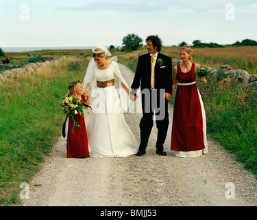 Scandinavia, Sweden, Oland, Bride and groom with bridesmaid and flower girl Stock Photo