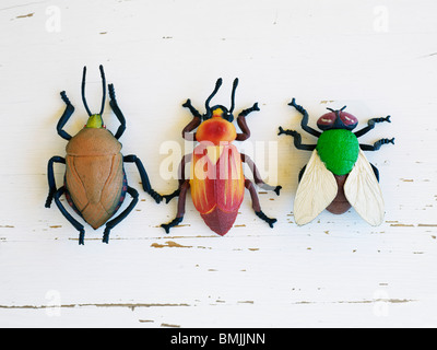 Scandinavia, Sweden, Three insects on white background, close-up Stock Photo