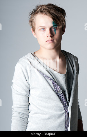 High Fashion Shot of a Teenage Boy with Fashion Makeup Stock Photo