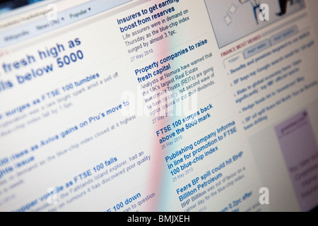 Close up of a computer monitor / screen showing the FTSE  and finance website Stock Photo