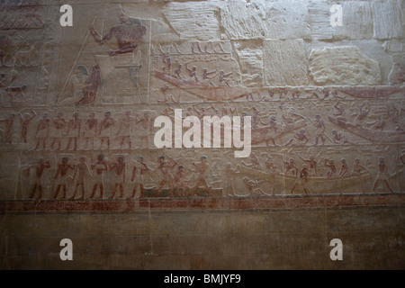 Bas-relief of Ti receiving offering and boats in the Mastaba of Ti, Saqqara, Al Jizah, Egypt Stock Photo