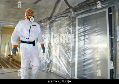 Worker specialized in asbestos removal Stock Photo