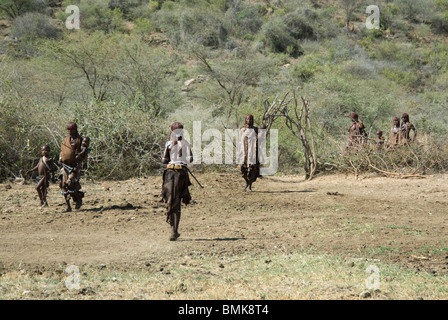 Ethiopia: Lower Omo River Basin, near Turmi and Dilabino, Hamar bull-jumping ceremony,women walking towards the village Stock Photo