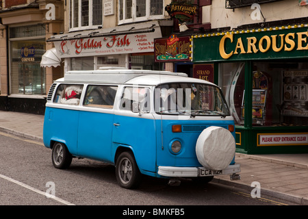 UK, England, Devon, Brixham Harbour, Volkswagen Camper Van parked outside takeaway food shops Stock Photo