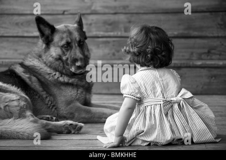 a little girl and her big dog Stock Photo