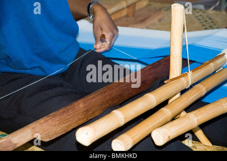Madagascar, Ambalavao. Woman weaving silk at the Fabrique de Papier Antaimoro Stock Photo