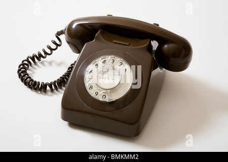 GPO / Post office domestic residential telephone from around 1970, with dial. (Phone number on the dial has had a digit deleted) Stock Photo