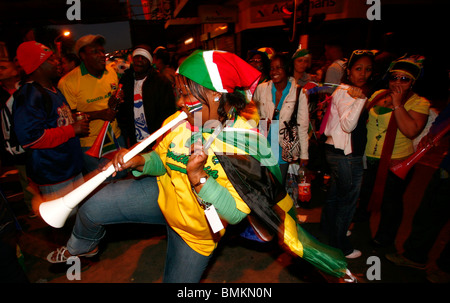 South African soccer fans celebrate in Cape Town after their team equalised with Mexico in opening game, 2010 Soccer World Cup Stock Photo