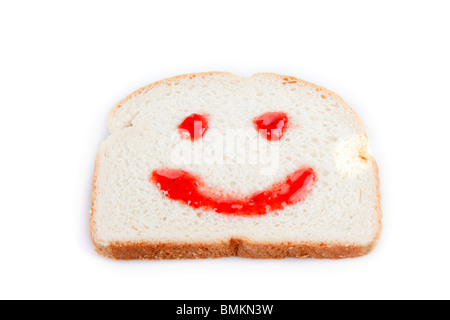 Happy face jelly on white bread Stock Photo