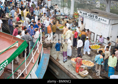 People get down from boat ; Sadarghat Boat terminal ; Dhaka ; Bangladesh Stock Photo