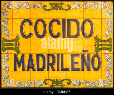 Madrid, Spain. Tiled restaurant Sign - 'Cocido Madrileno' - local Madrid cuisine Stock Photo