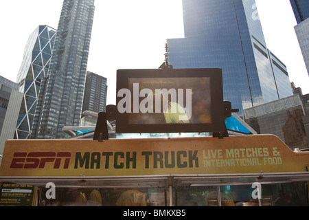 ESPN Match Truck showing World Cup Soccer matches parked on Columbus Circle and Central Park South in New York City Stock Photo