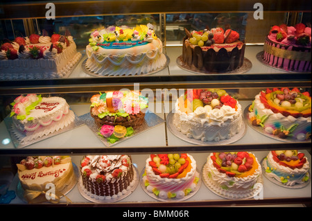 London, UK, Chinatown, Chinese Bakery, Detail Cakes, bakery shelves display in Shop Window Stock Photo