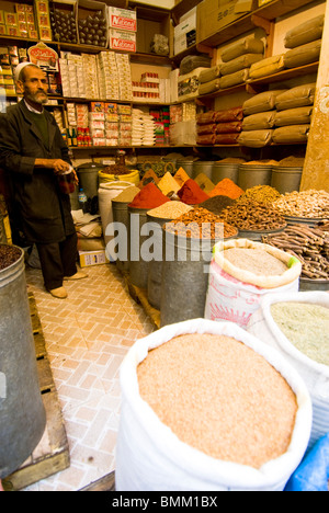 Fez Morocco spice seller and bags of spices in the old medina Stock Photo