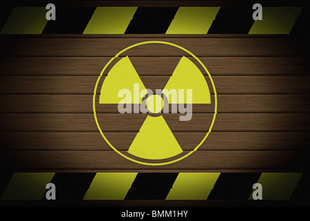 Nuclear warning sign on wall Stock Photo