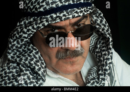 Portrait of an Arab with the traditional Arabic head dress Stock Photo