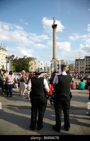 police officers in Trafalgar Square London Stock Photo