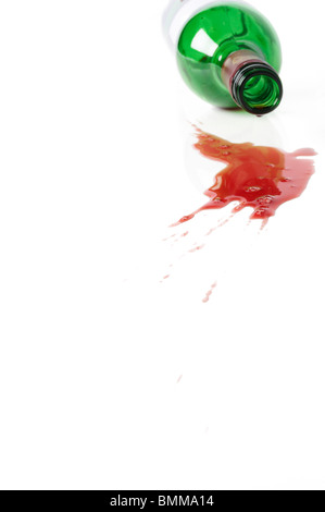 Spilled bottle of wine on a white background Stock Photo