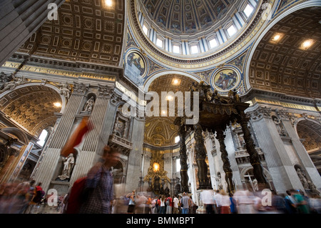 Details of the ceiling, dome and Bernini Baldacchino or Baldaquin at St Peter's Basilica or Basilica di San Pietro. Rome, Italy Stock Photo