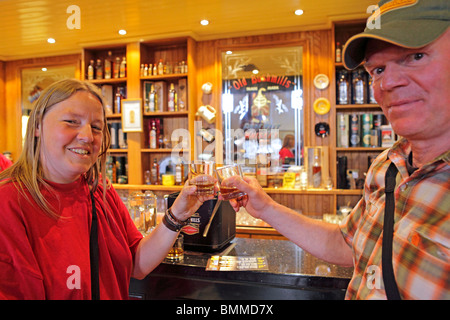 visitors at Bushmills Whiskey Distillery, Co. Antrim, Northern Ireland Stock Photo