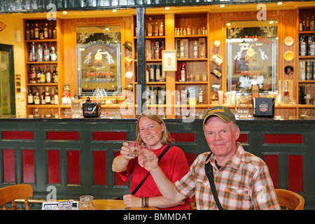 visitors at Bushmills Whiskey Distillery, Co. Antrim, Northern Ireland Stock Photo