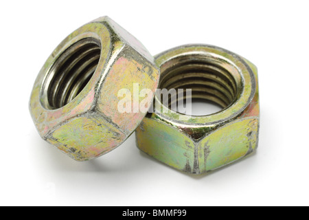 Two large metal nuts on white background Stock Photo