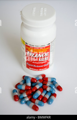 Tylenol (acetaminophen) packaging and pills.  Stock Photo