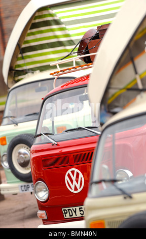 Several classic VW camper vans lined up ready for their travels. Stock Photo