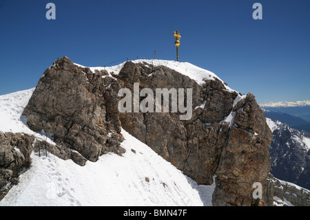 Gold cross on the summit of the Zugspitze, Germany's highest point Stock Photo