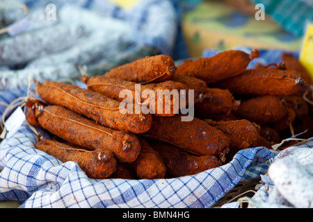 Pimento coated salami at french market Stock Photo