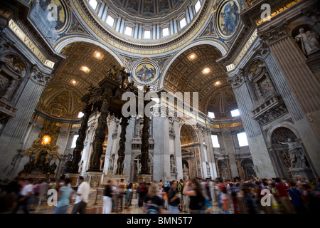 Details of the ceiling, dome and Bernini Baldacchino or Baldaquin at St Peter's Basilica or Basilica di San Pietro, Rome, Italy Stock Photo
