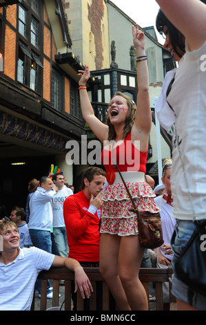 England football fans drinking beer and cheering at a pub in Brighton during the World Cup 2010 Stock Photo