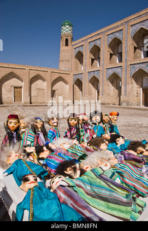 Puppets on sale, Streets of Khiva, Uzbekistan, Asia. Stock Photo