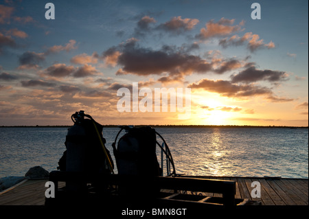 Diving Equipment Set Up Overlooking Caribbean Sunset on Bonaire Stock Photo