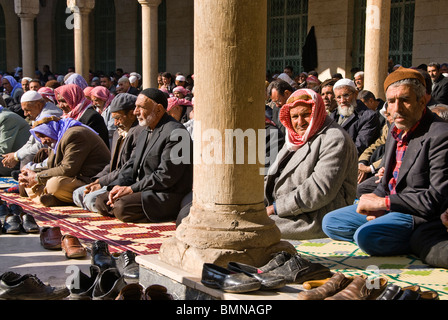 Group of muslim people praying in a mosque, Sanliurfa, Turkey, Asia. Stock Photo