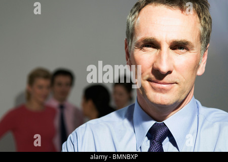 Confident business man looks to camera Stock Photo