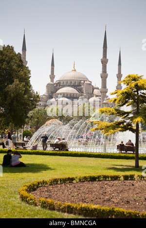 Tourists in front of Sultanahmet Mosque, also known as the Blue Mosque and Sultan Ahmed Mosque, Istanbul, Turkey Stock Photo