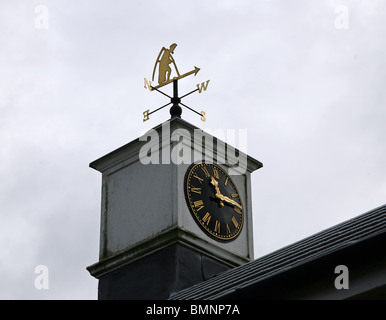 A weather vane showing old father time or the grim reaper on a clock tower Stock Photo