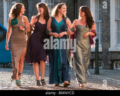 Cambridge University students leaving the May Ball, held at the end of the academic year in June. Stock Photo