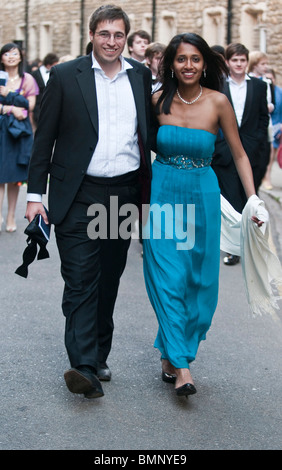 Cambridge University students leaving the May Ball, held at the end of the academic year in June. Stock Photo